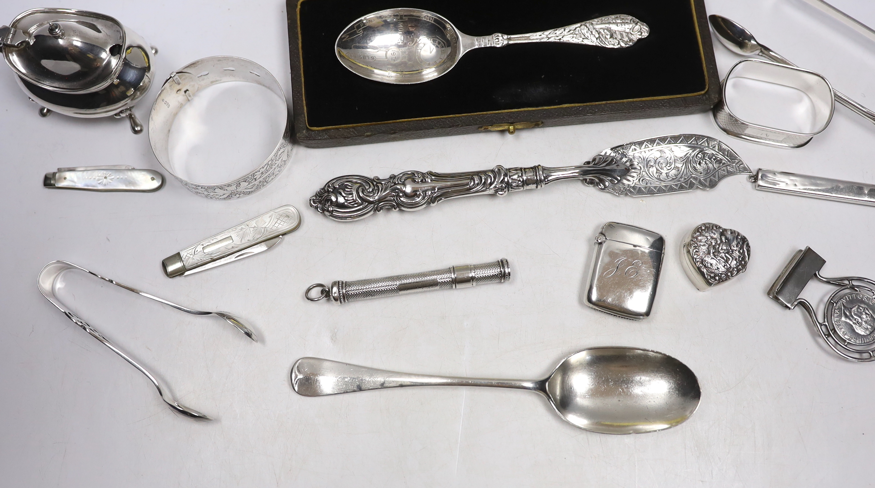 Sundry small silver including bracelet, dessert spoon, fruit knives, mustard, vesta pill box, sterling spoon, butter knife, etc.
